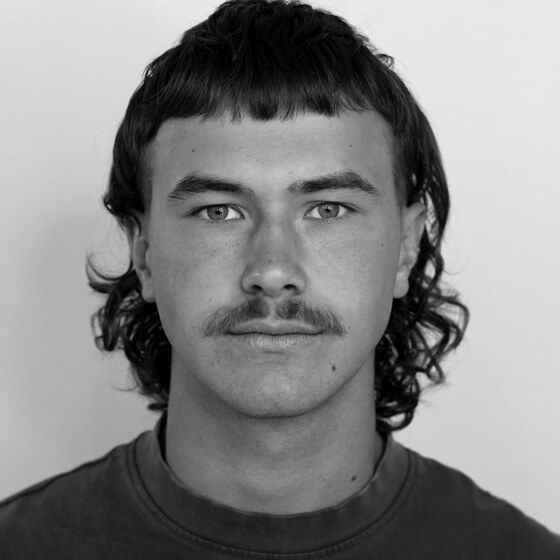 Archie, barber at Gallery X Barbershop, Hamilton